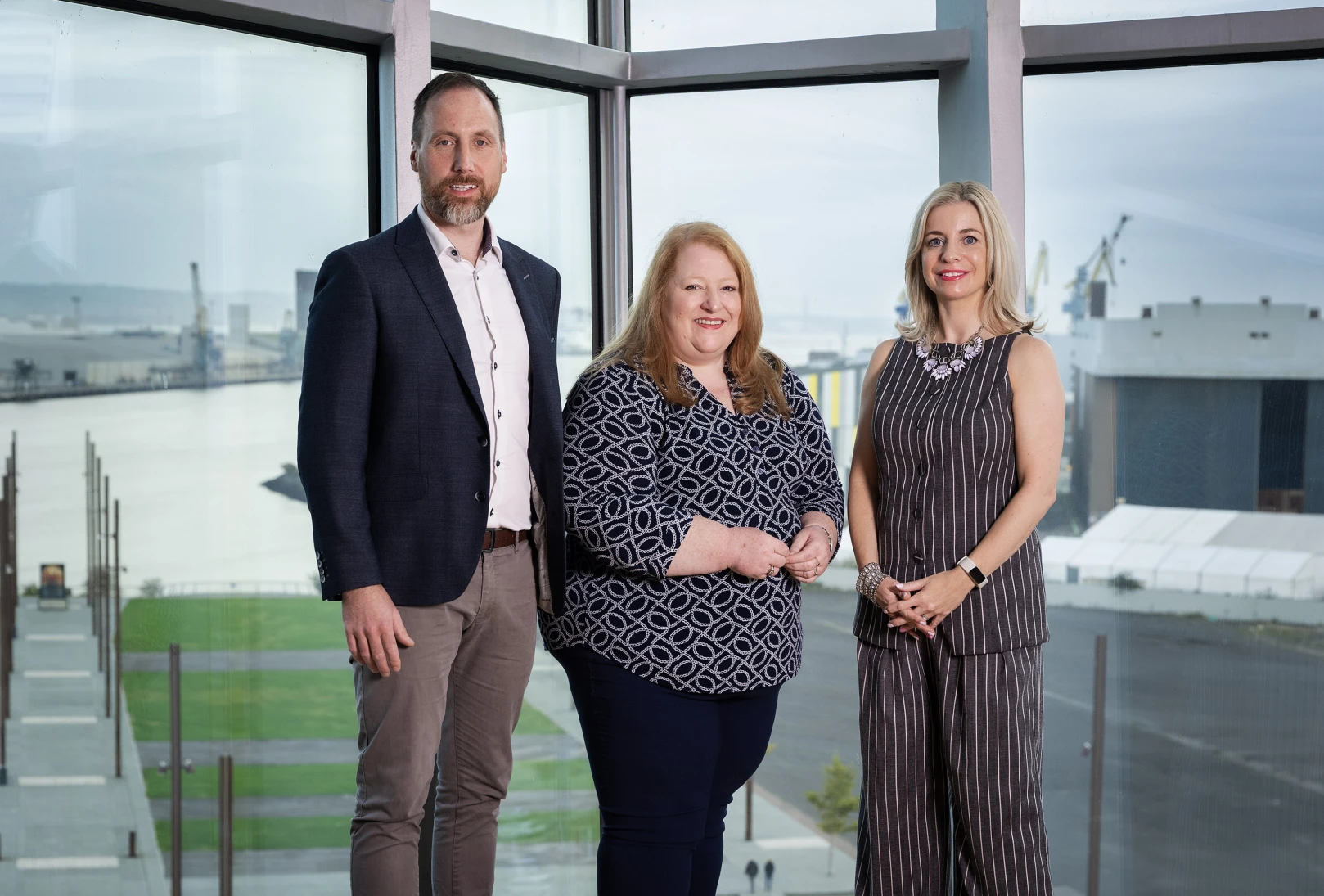 From L-R are Stephen McKeown (Allstate NI), Justice Minister Naomi Long MLA and Director of Diversity Mark, Christine White